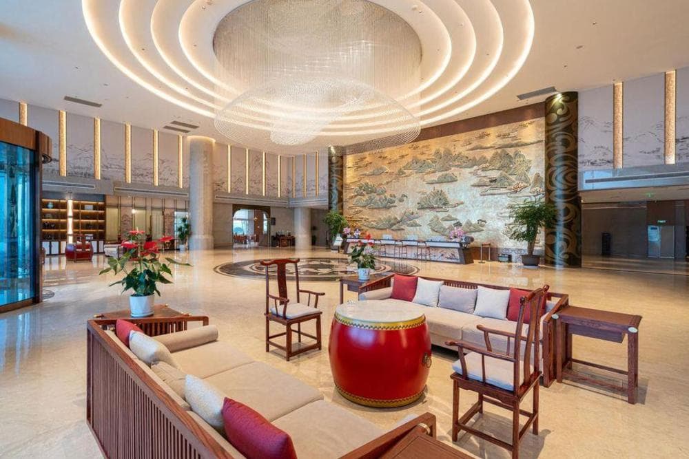 Grand Rezen lobby with circular crystal chandelier and traditional Chinese drum